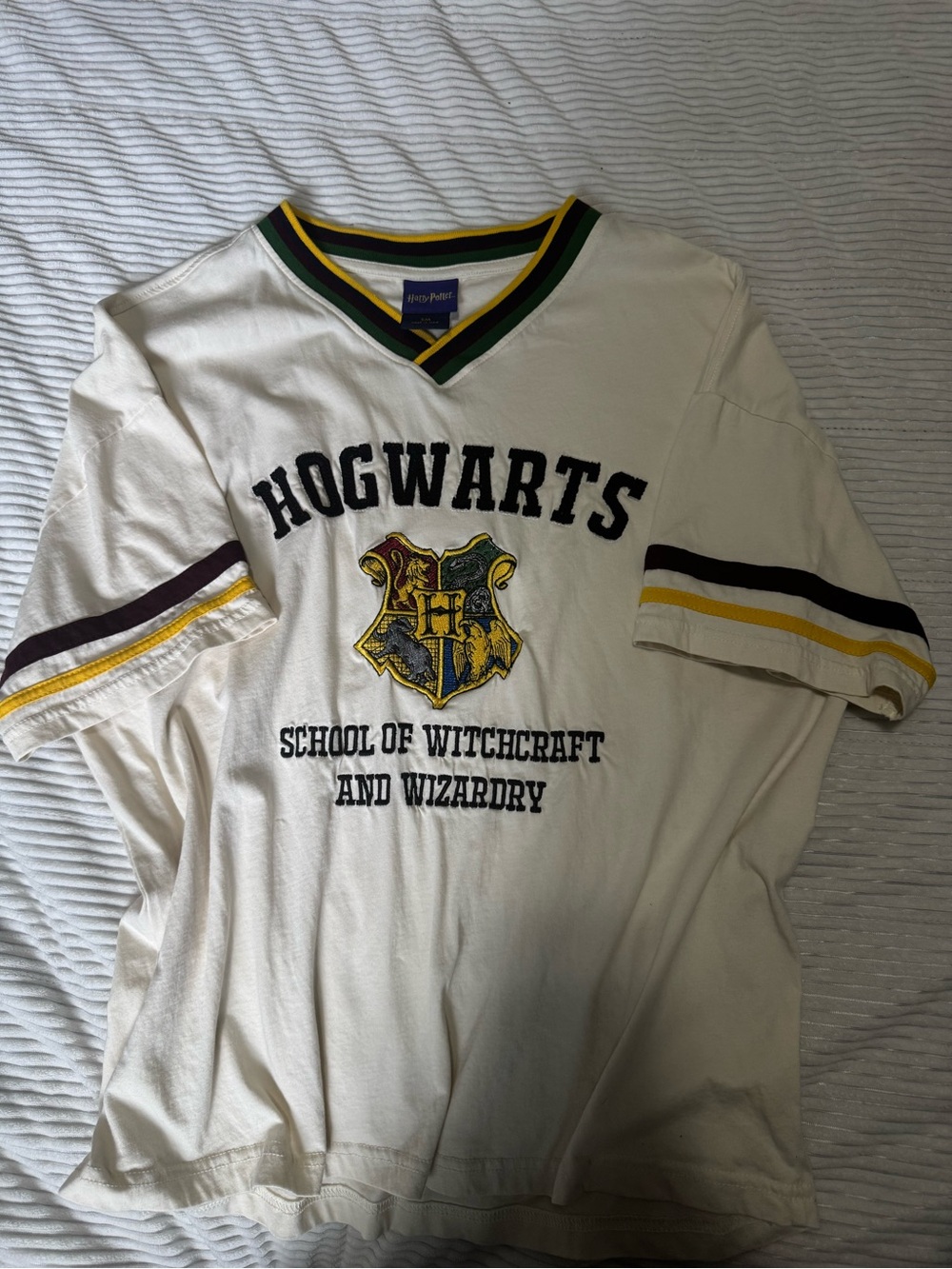 Warner Bros. Hogwarts Cream Short Sleeve Tee with Yellow & Black Accents